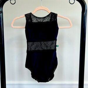 Lucky Leo Women’s size xs - black with lace, excellent condition.